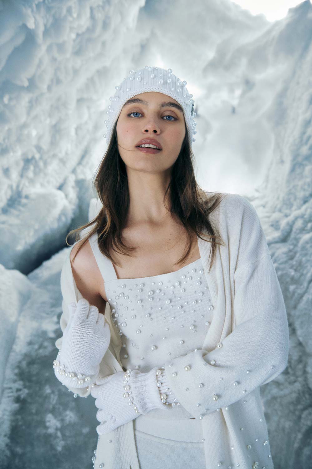 Fashion model posing inside Zermatt Ice Cave location scouting