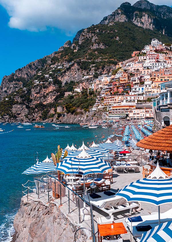Summer fashion shoot location Positano beach umbrellas