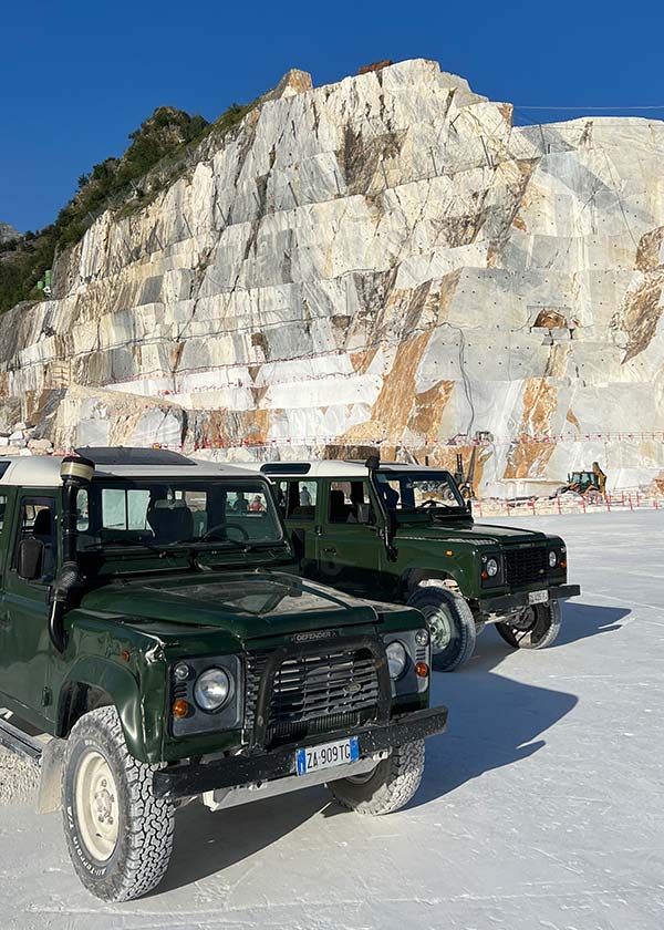 Production location scouting at Carrara Marble Quarries, featuring 4x4 logistics for crew access in active mining sites