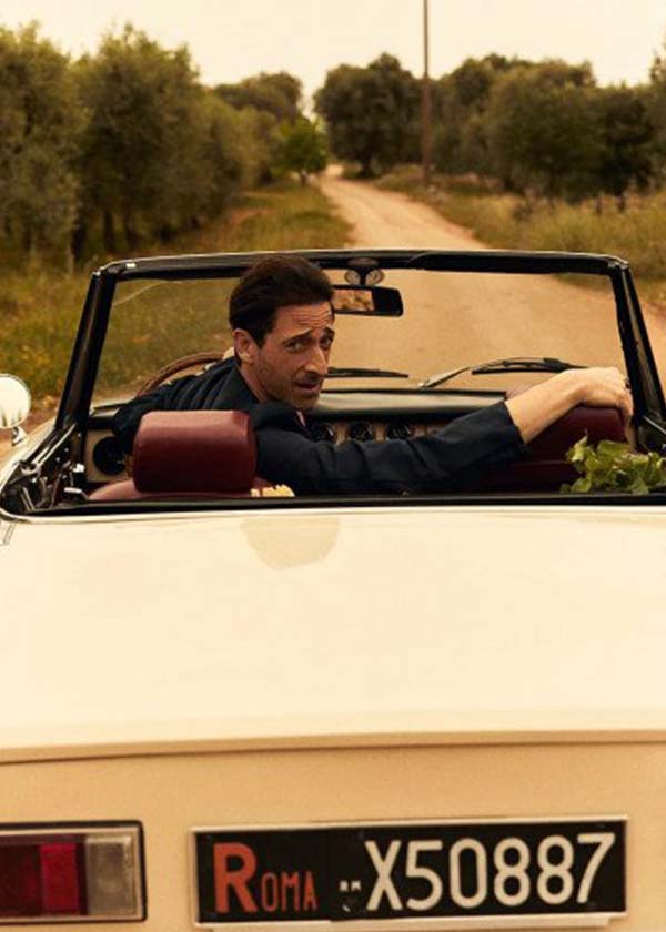 drien Brody driving a vintage Alfa Romeo picture car in the Puglia countryside for the Kith campaign, managed by Courage Production
