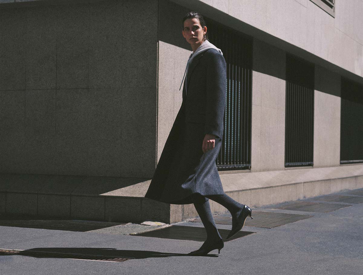 Fashion shoot on concrete sidewalks in Milan, coordinating local crew and street logistics