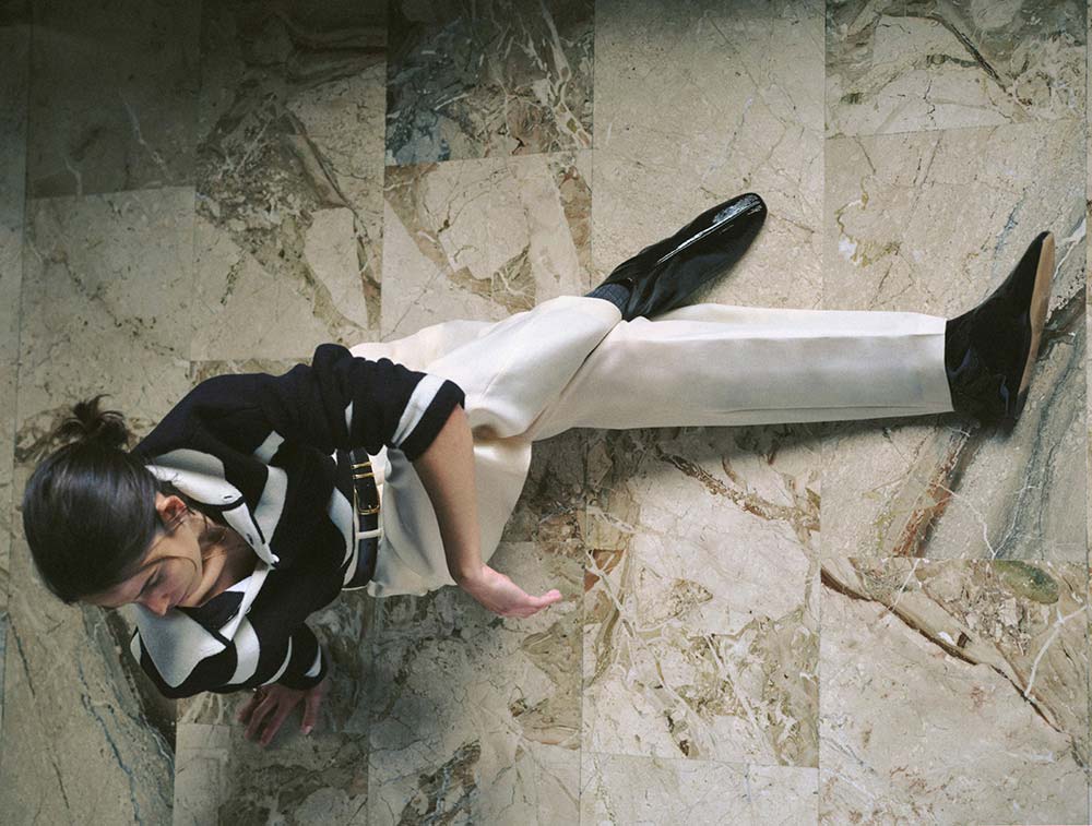 Mid-century marble lobby location secured by our production team in Milan