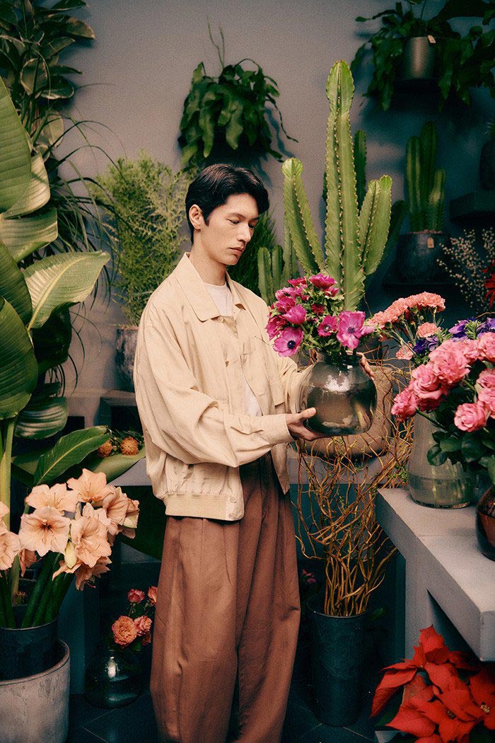 Fashion model at a local florist shop, secured as an urban shooting location in Milan by Courage Production