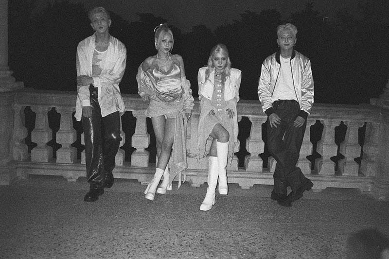 KARD are on set in Italy, shooting their music video in a villa outside Milan