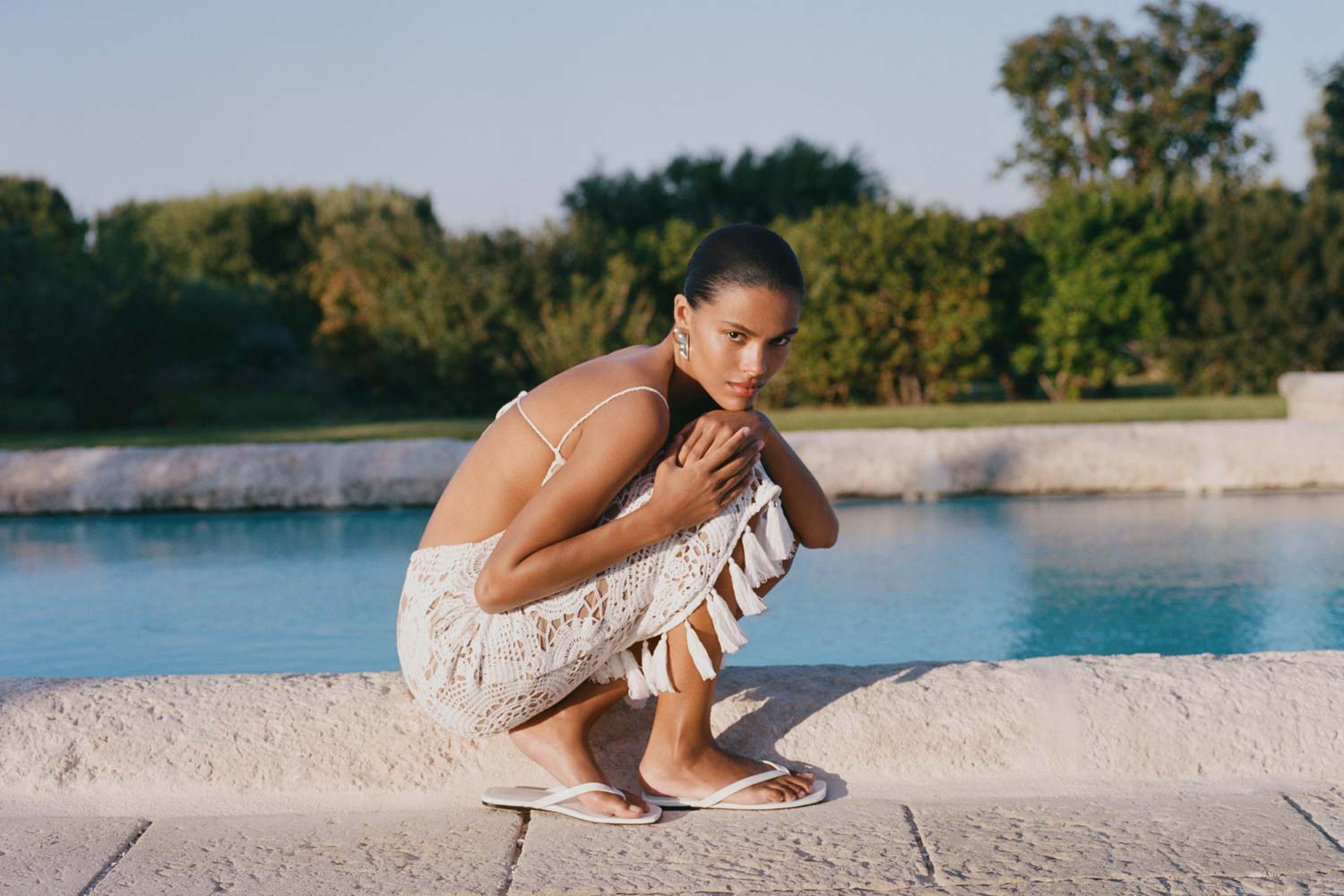 Meshky campaign photo shoot at a masseria's pool